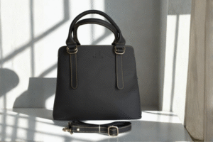 Black top-grain leather handbag for women with contrast stitching and detachable strap – Obsidian Grace Handbag