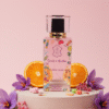 Bloom Candy perfume bottle for women with girly pink design inspired by Purple Oud, featuring woody oud, citrus, and spicy notes.